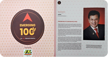 Brochure or magazine page featuring an 'Emerging 100' award with a person's photo and text.