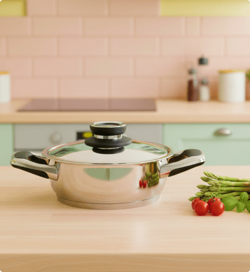 Stainless steel pot with lid on a kitchen counter with vegetables