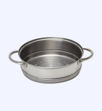 Stainless steel steamer pot on a light gray background