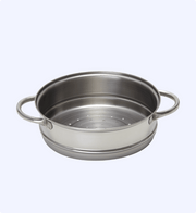 Stainless steel steamer pot on a light gray background