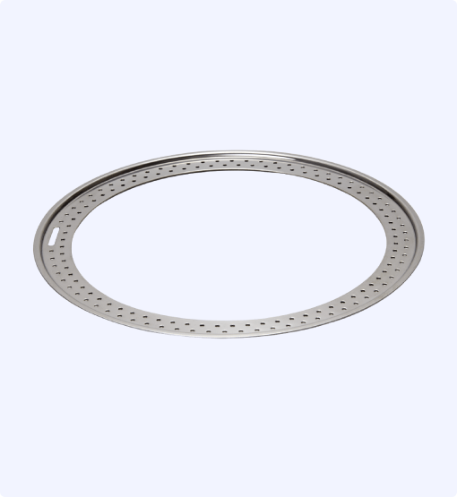 Metallic circular component on a white background