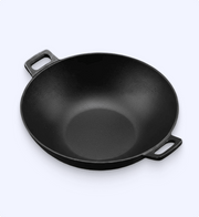 Black cast iron wok on a white background