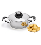 Stainless steel pot with lid and potatoes on a white background