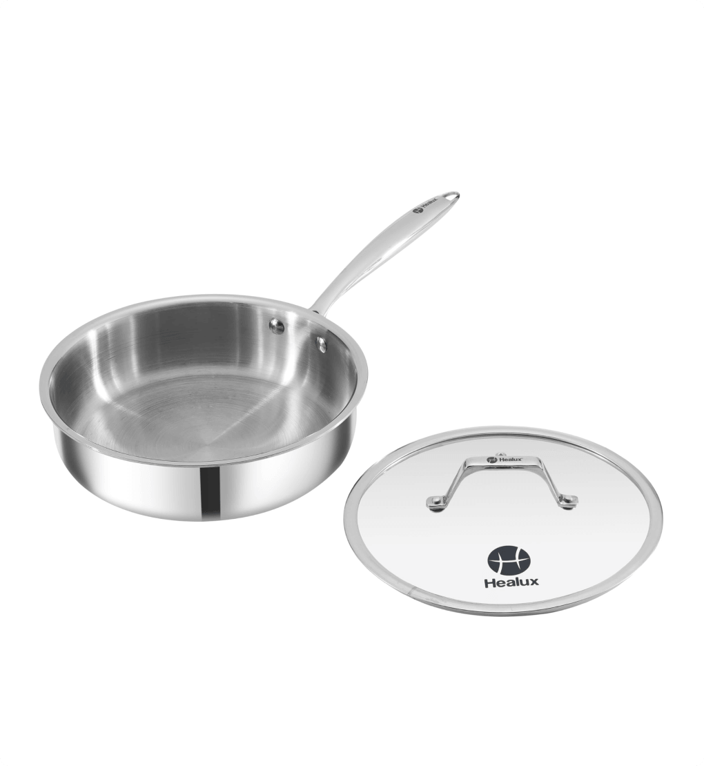 Stainless steel frying pan with lid on a white background, featuring the Healux brand.