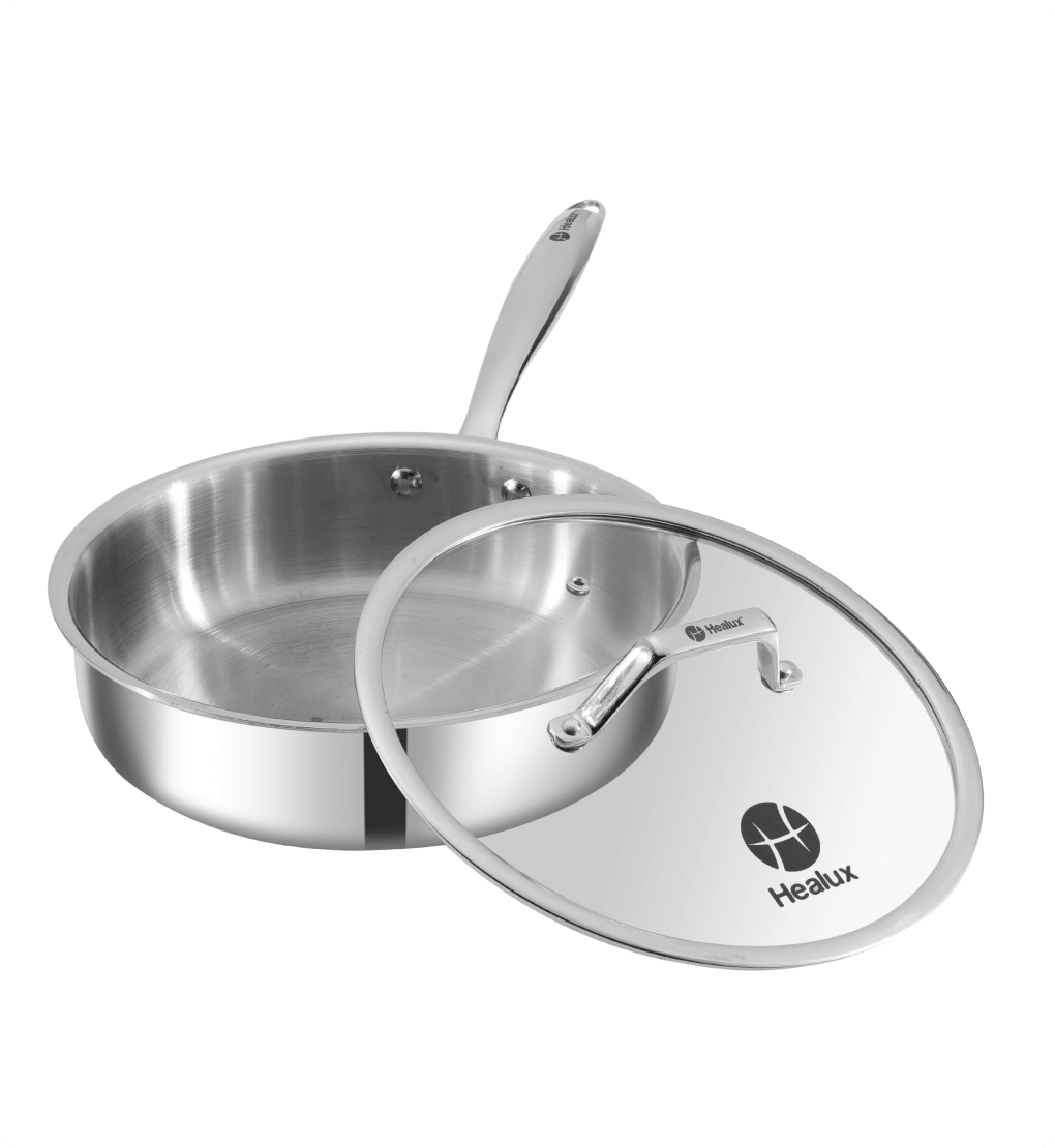 Stainless steel pan with lid on a white background, featuring the Heалux brand.
