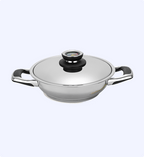 Stainless steel wok with lid on a white background