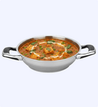 Stainless steel kadai with paneer butter masala on a white background