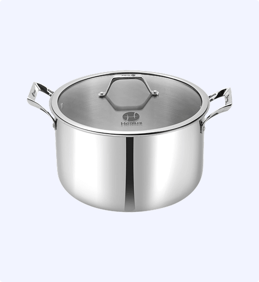 Stainless steel pot with lid on a light gray background