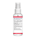 Clear spray bottle with white cap and red label on a white background