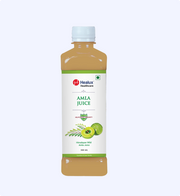 Bottle of Heelux Amla Juice on a white background
