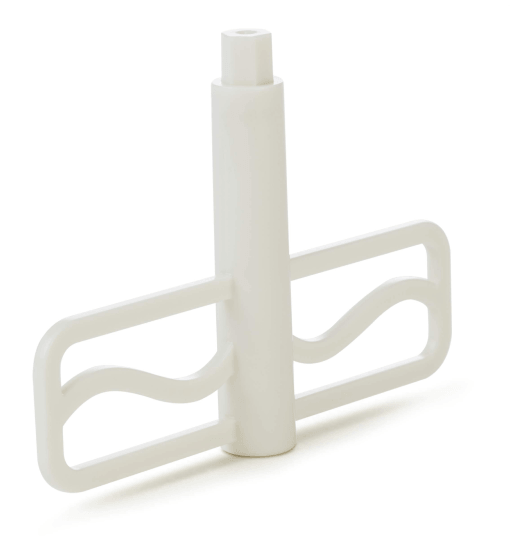 White ceramic vase with a unique design on a white background