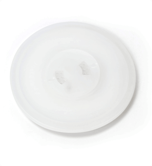 White ceramic plate on a white background