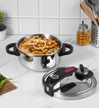 Stainless steel pressure cooker with food on a kitchen counter