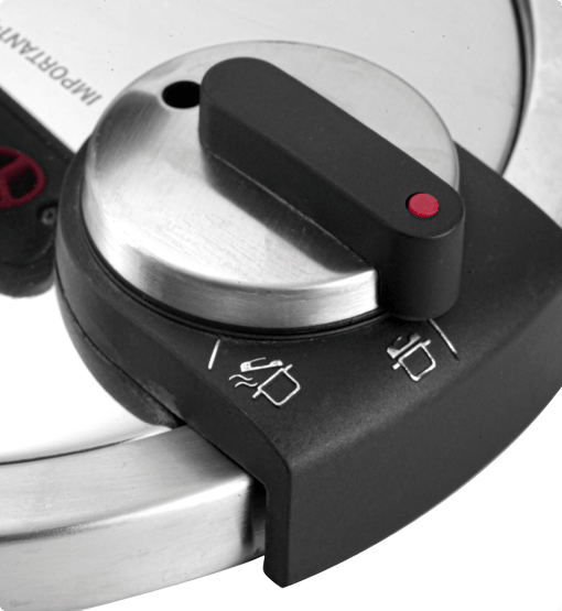Close-up of a stove knob with control icons on a white background