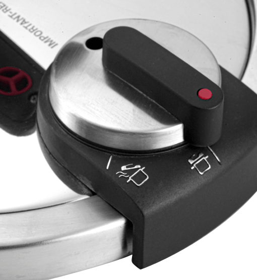 Close-up of a control knob on a kitchen appliance with labels for different functions.