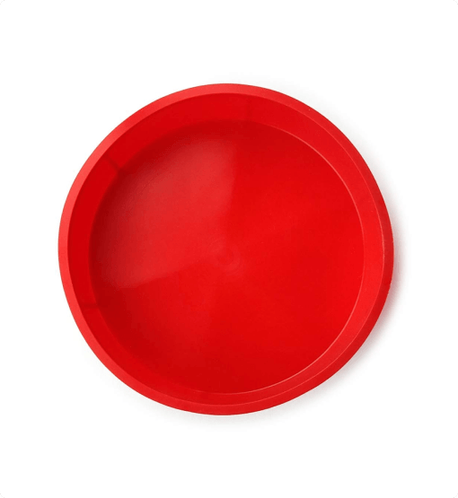 Red round silicone mold on a white background