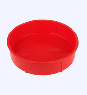 Red plastic basin on a white background