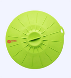 Green silicone lid with Healux logo on a white background