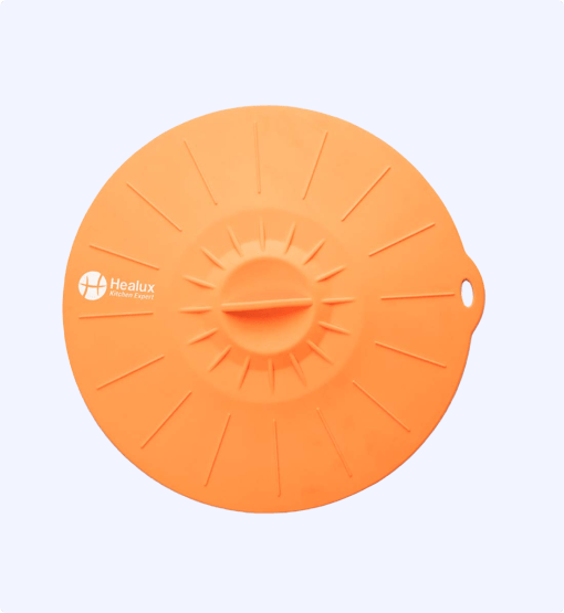 Orange silicone lid with 'Healux' branding on a light gray background