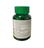 Bottle of supplements with a green cap on a white background