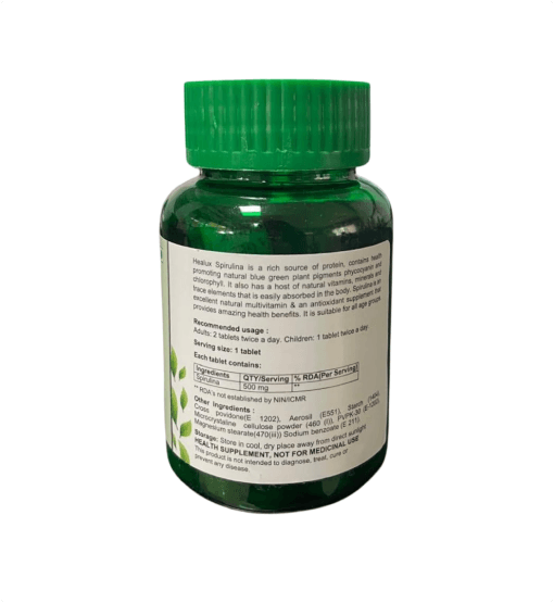 Bottle of supplements with a green cap on a white background