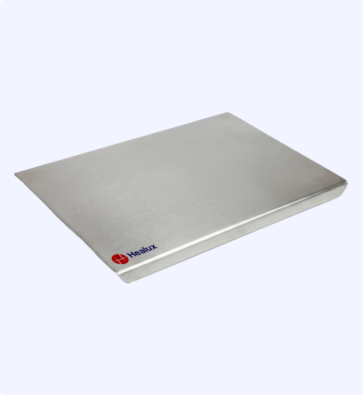 Metallic surface with 'Healux' logo on a white background