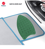 Ironing board cover with green iron-shaped pad and Healux branding