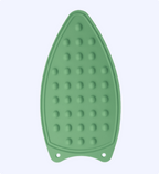 Green silicone ironing board cover on a light gray background
