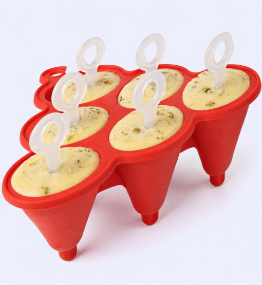 Red silicone popsicle mold with four compartments on a white background