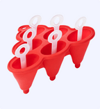 Red silicone ice pop mold with white handles on a white background