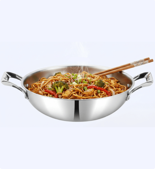 Stainless steel wok with noodles and vegetables on a white background